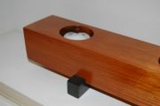 A candle holder made from pallet material, of an unknown tropical hardwood & Ebony