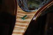 The Chrysocolla inlaid dun on Curly Maple