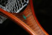A Chrysocolla inlaid Adams on Curly Walnut