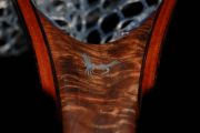 An Aluminum Royal Wull on Curly Claro Walnut Burl