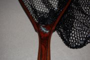A beautiful rich cocobolo handle with a wenge edged mahogany hoop inlaid pewter brook trout 