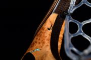 The Carolina Cherry Burl handle with inlaid copper in Kingman turquoise and note inlaid in Blk Stone