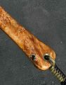 Kingman turquoise inlaid in the natural bark inclusion
