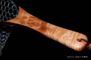 Cat's Paw Burl Maple with copper inlaid into the open burl eyes. The hoop is Wenge and all accents a