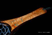 Carolina Cherry Burl with a Wenge spine for strength. The hoop is Wenge. Inlaid turquoise & Copper.